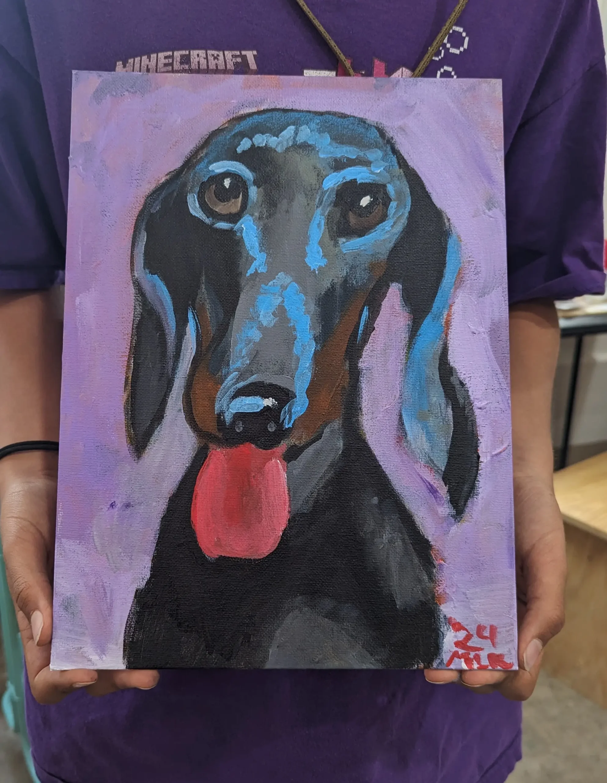 artwork of black dog with tongue out
