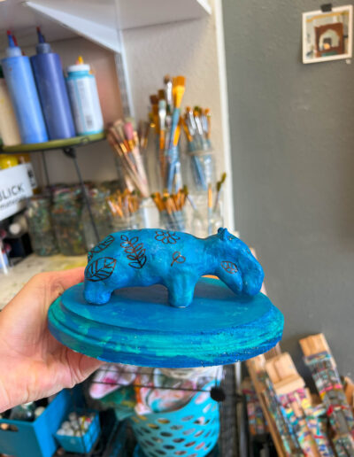 Sculpture of blue hippo