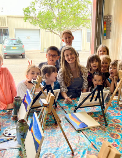 many young children in studio smiling for the camera