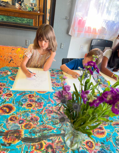 two young students painting