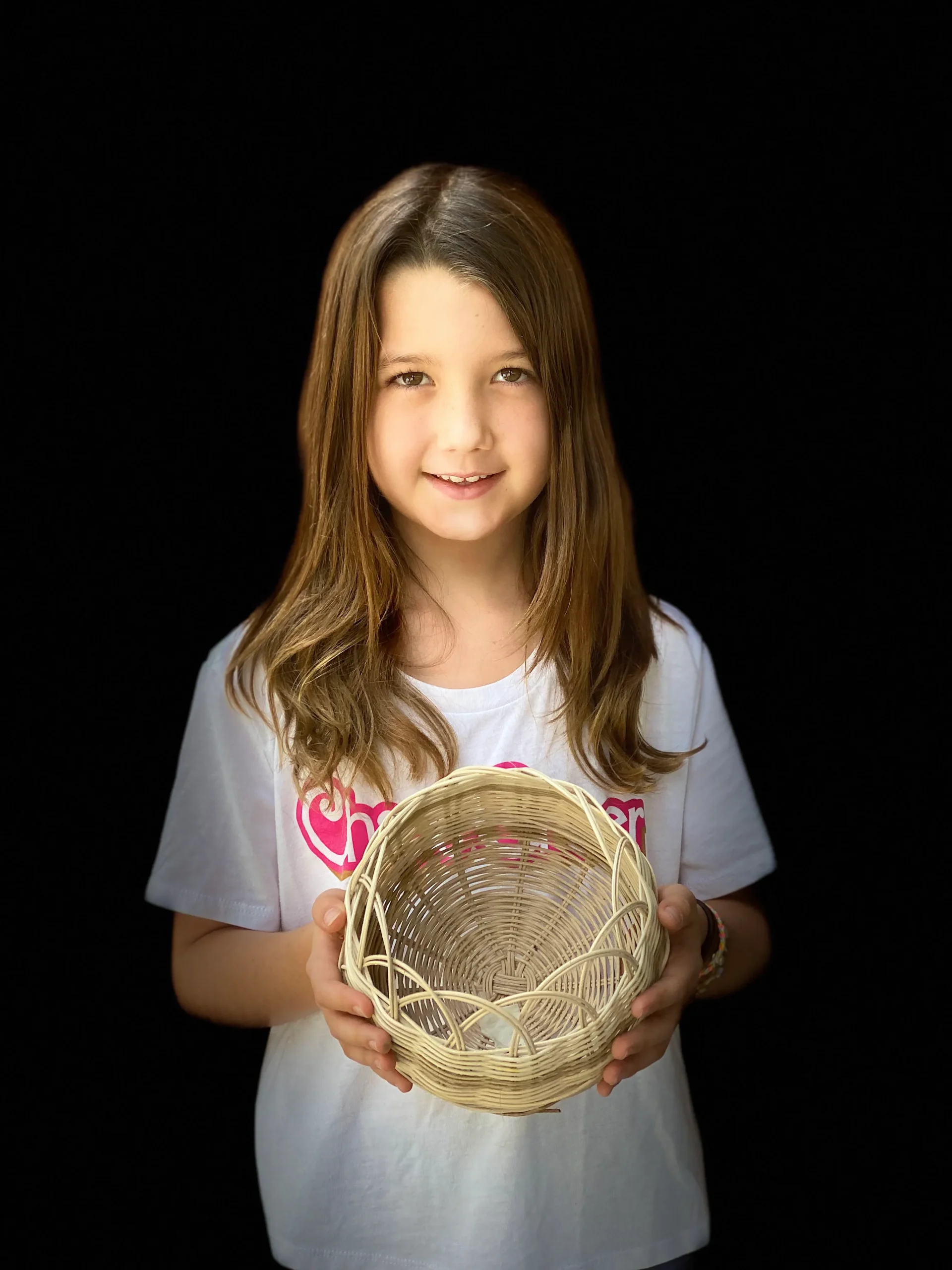 girl displaying her basket