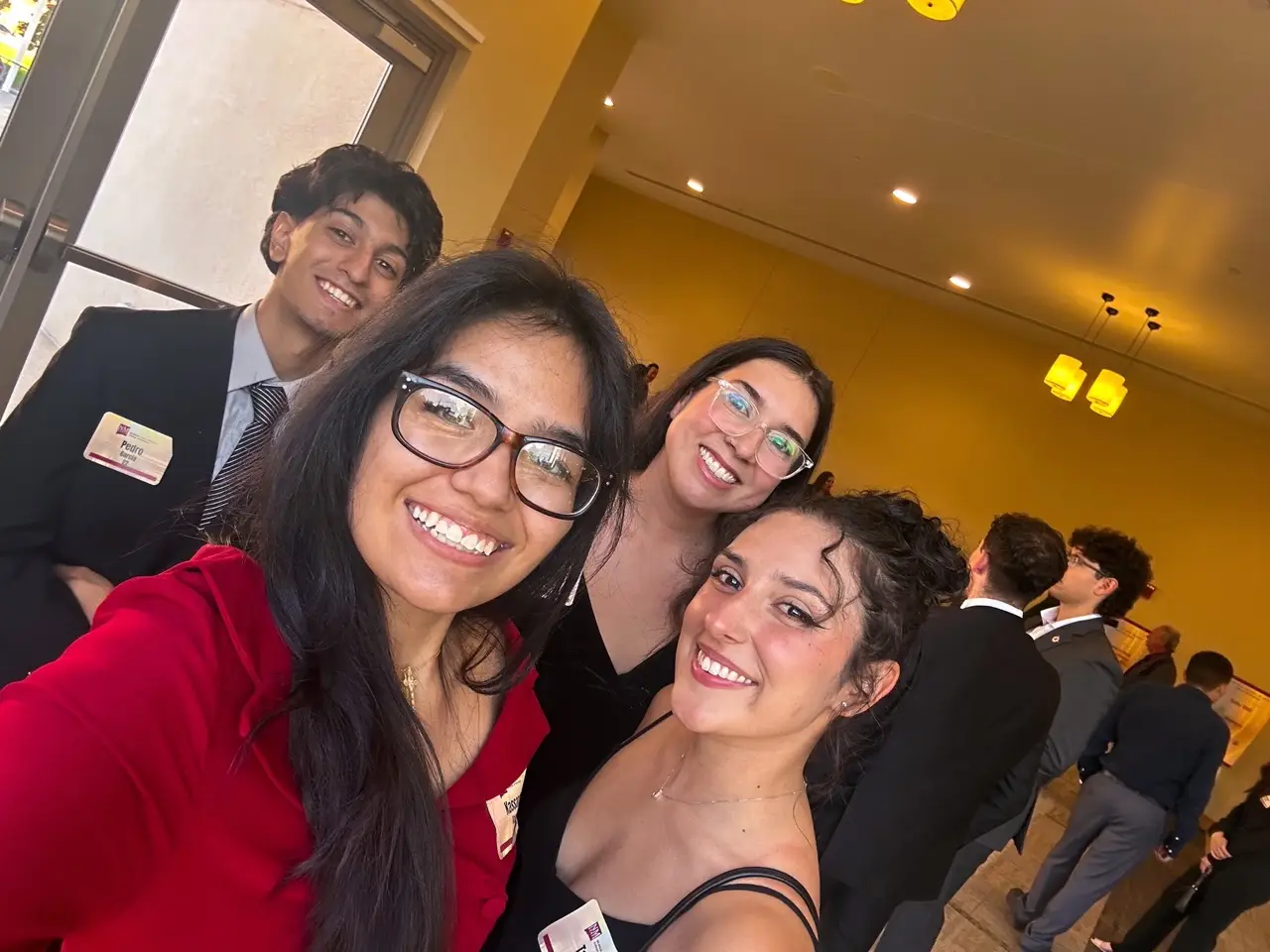 Taeya Padilla, right, attended the New Mexico State University College of Business alumni dinner with friends.