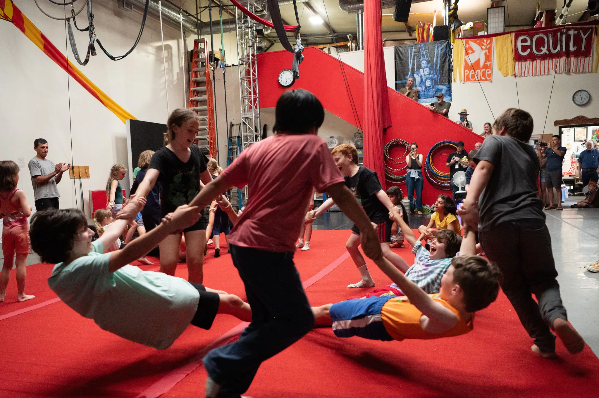 An acrobatic demonstration of a hand-to-hand spinning circle. Photo courtesy of Court Kessler.