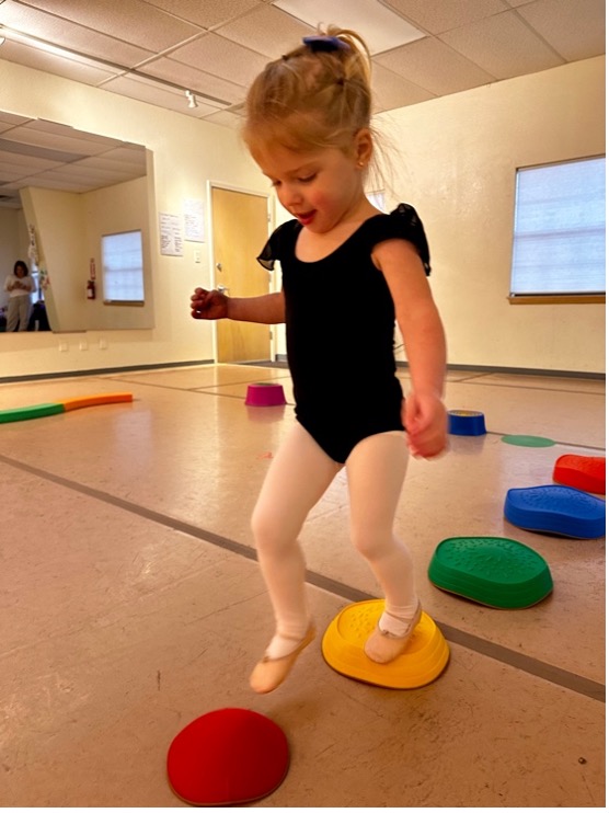 A 3-year-old in movement class