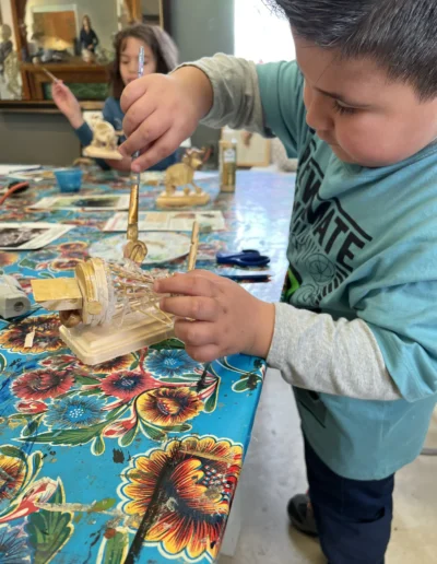 boy making sculpture