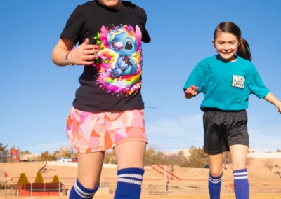 Rylynn and Raegan playing soccer