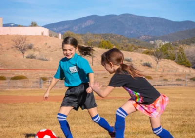 Rylynn and Raegan playing soccer