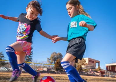 Rylynn and Raegan playing soccer