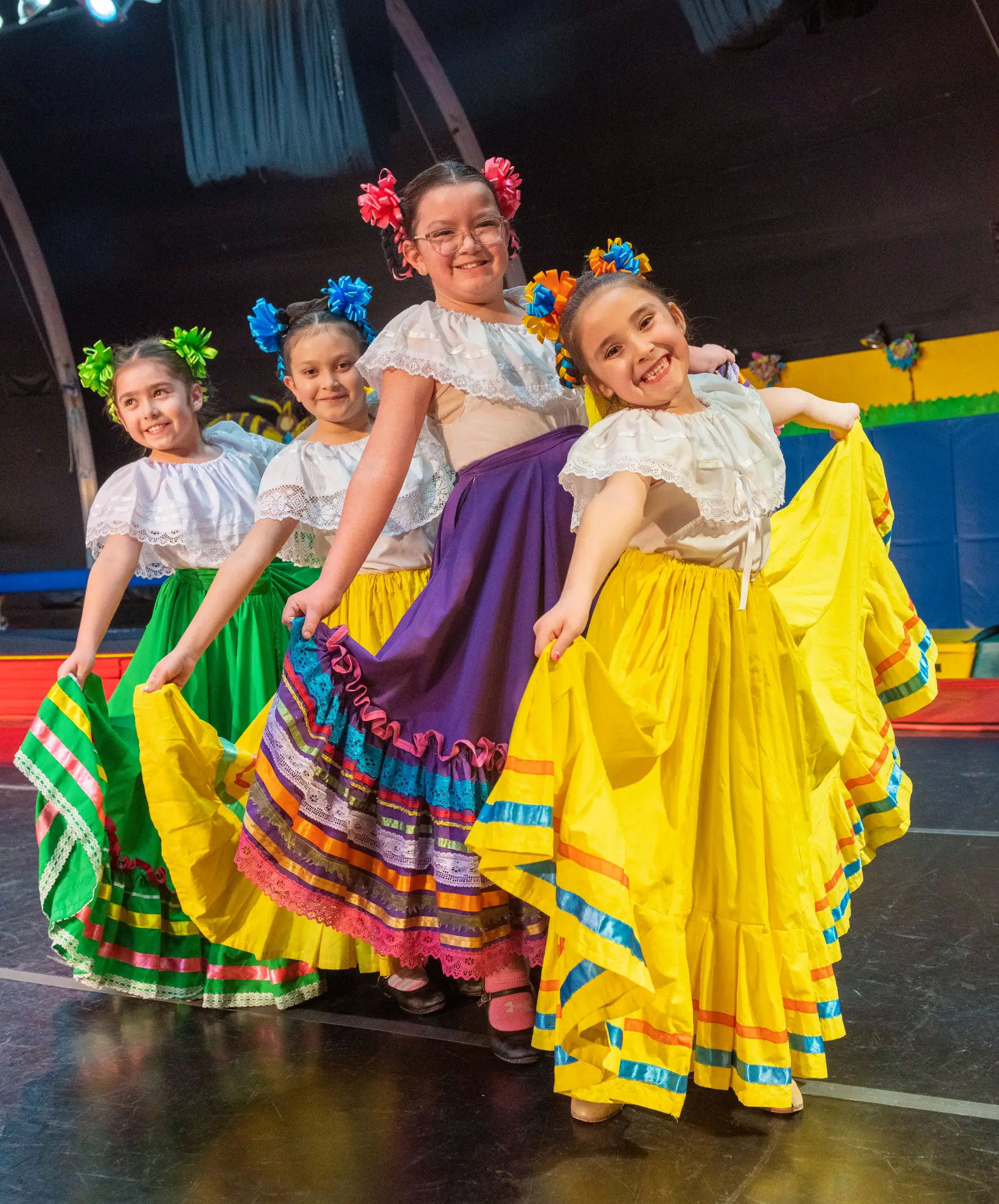 Four girls dancing