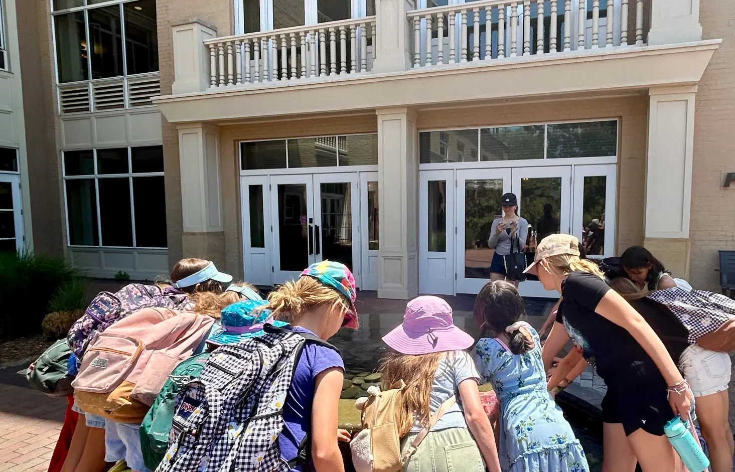 Campers on a field trip downtown Field trip adventures allow campers to appreciate parts of their own city and wilderness areas.