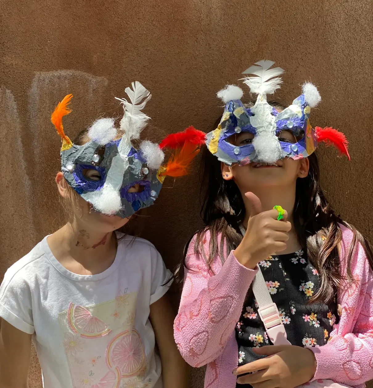 two student with cool matching masks