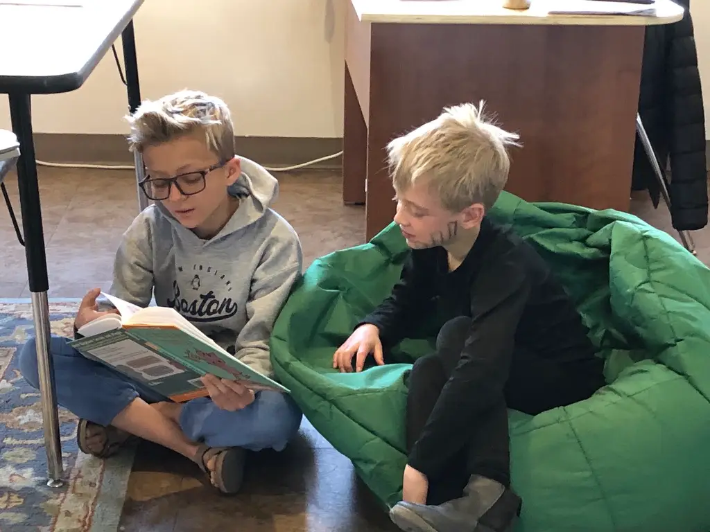 Courtesy photo: Students read together at the May Center for Learning.